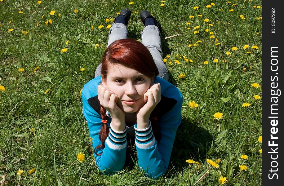 Young girl laying on meadow. Young girl laying on meadow