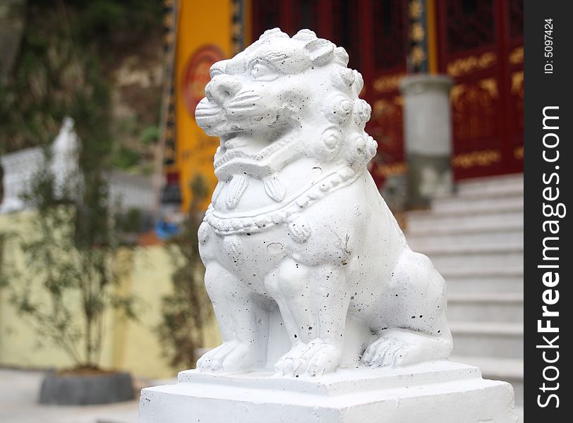 This is a stone lion,it stands in front of a temple for many years!. This is a stone lion,it stands in front of a temple for many years!