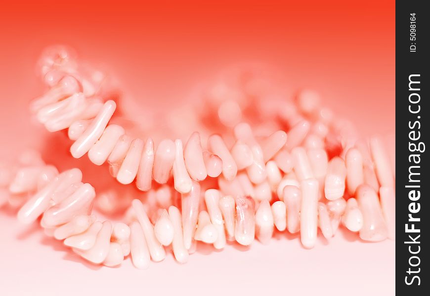 Natural coral beads, close-up, fading to soft-focused area