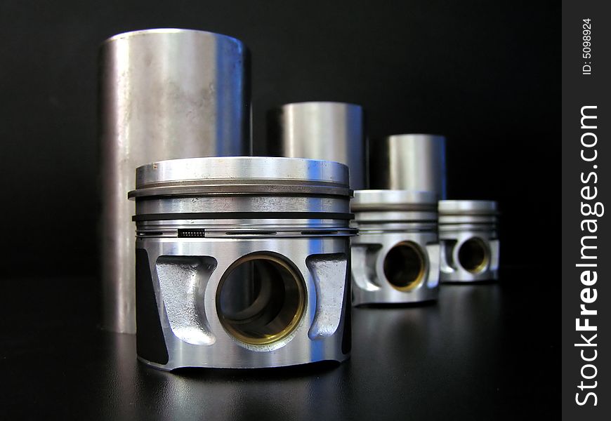Set of liners and pistons isolated on black