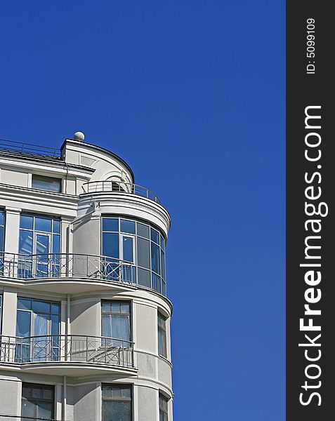 Modern a vein the house on a background of the dark blue sky. Modern a vein the house on a background of the dark blue sky