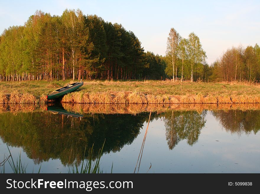 Kayak on the bank of the lake