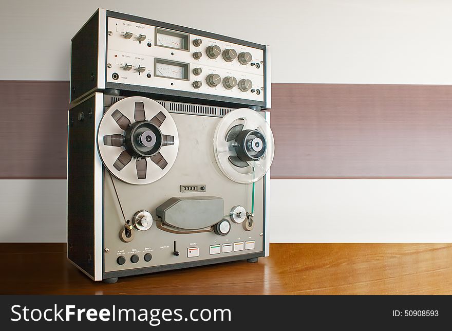 Professional reel tape recorder on the table