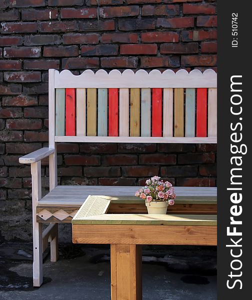 Colorful wooden bench and table. Colorful wooden bench and table