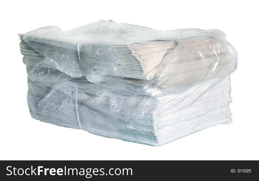 Stack of newspapers fresh from the press - isolated on white with clipping path. Stack of newspapers fresh from the press - isolated on white with clipping path