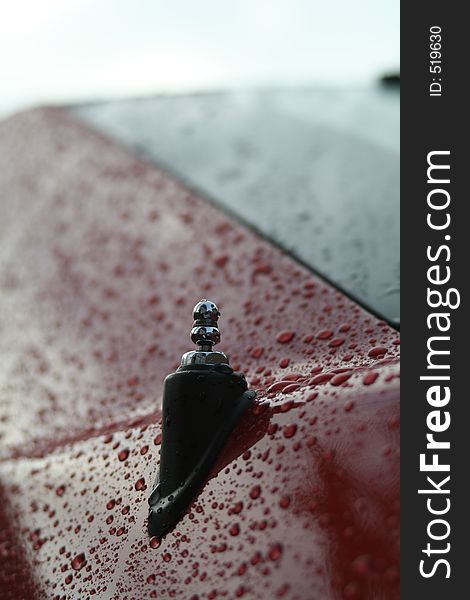 A drawn-in antenna with raindrops at the car. A drawn-in antenna with raindrops at the car.