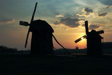 Old Windmills Against Sunset Sky Royalty Free Stock Photos Old Windmills Against Sunset Sky Royalty Free Stock Photos