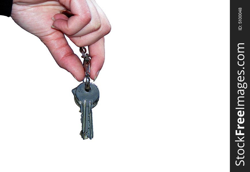 Hand with keys isolated on white background