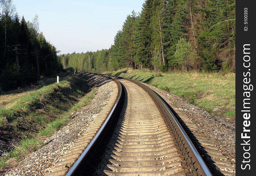 Railway track in the forest, Russia