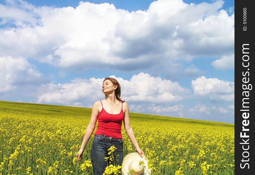 Beautiful young girl enjoying summer sun