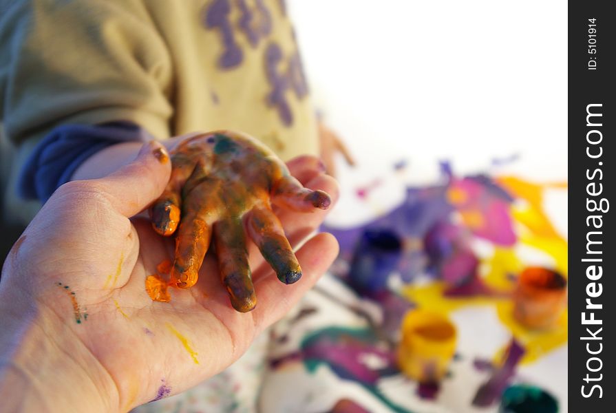 Girl Painting With Her Mother