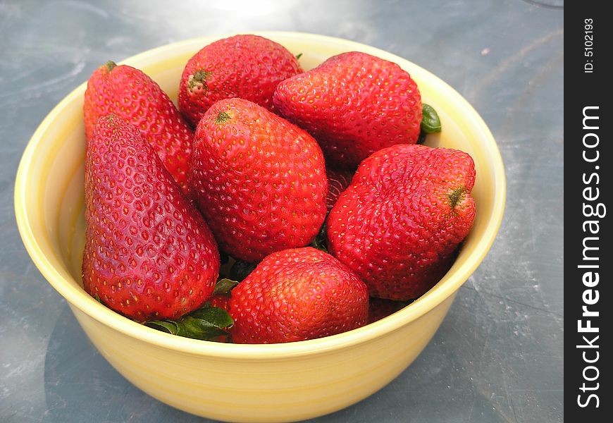 Closeup shot of a bowl of fresh strawberries. Closeup shot of a bowl of fresh strawberries.