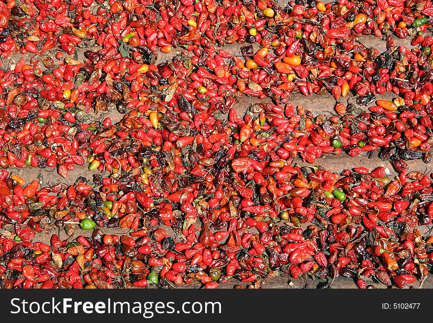 Chillies drying naturally on the roof of a house. Guatemala
