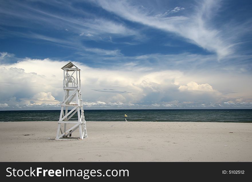 Old lonely wooden lifeguard tower on a beach in Tela. Honduras. Old lonely wooden lifeguard tower on a beach in Tela. Honduras