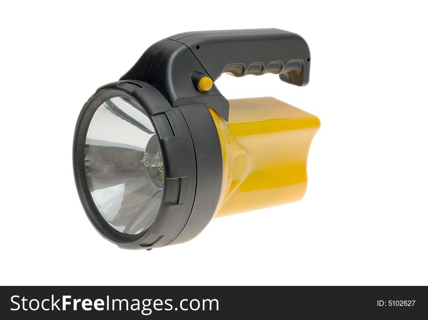 A yellow big flashlight isolated over white. A yellow big flashlight isolated over white