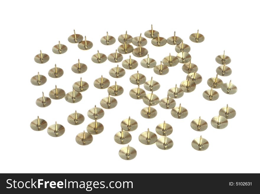 A set of golden drawing pins pinpoints up