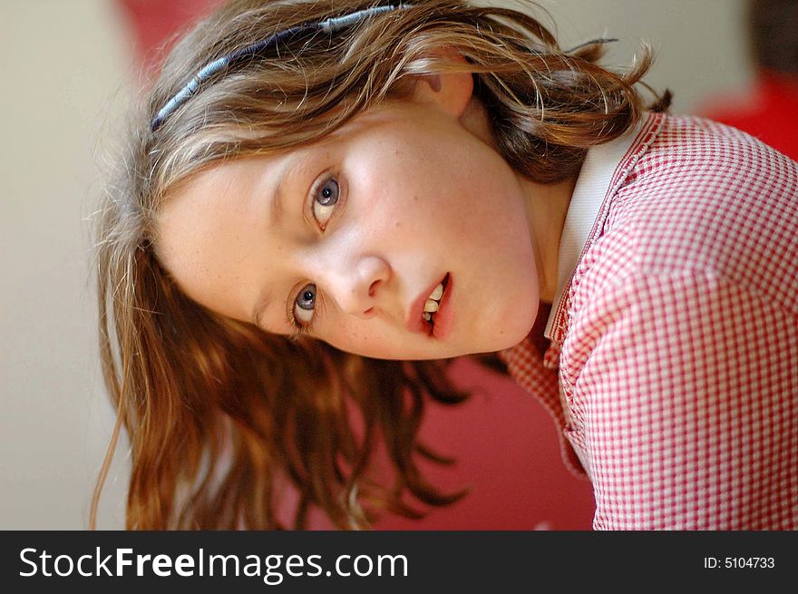 Close-up interior portrait of girl, natural light. Close-up interior portrait of girl, natural light