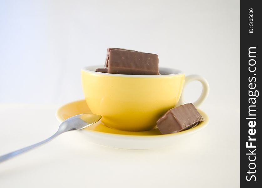 Chocolade Candies In Yellow Cup, Hot Chocolate