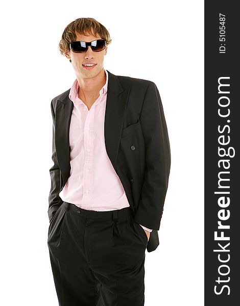 Handsome young businessman posing in fashionable sunglasses.  Isolated on white. Handsome young businessman posing in fashionable sunglasses.  Isolated on white.