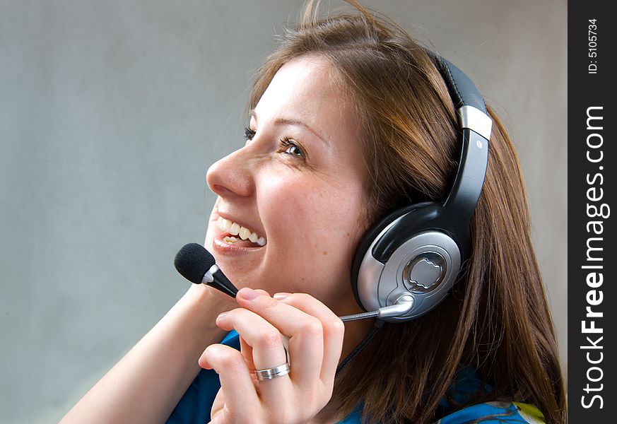 Smiling business woman. Over grey background