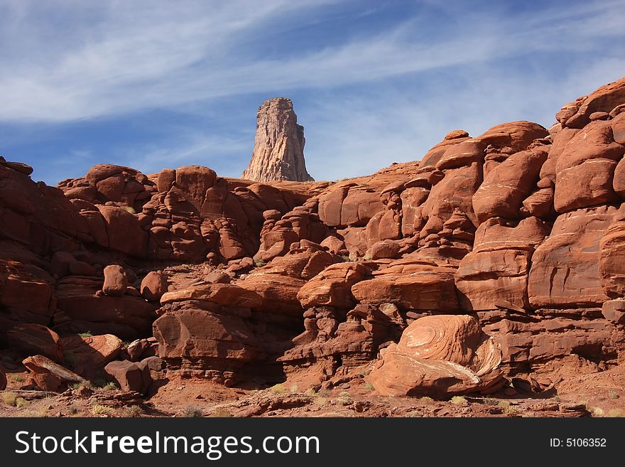 View of the red rock formations in Canyonlands National Park with blue sky�s and clouds. View of the red rock formations in Canyonlands National Park with blue sky�s and clouds
