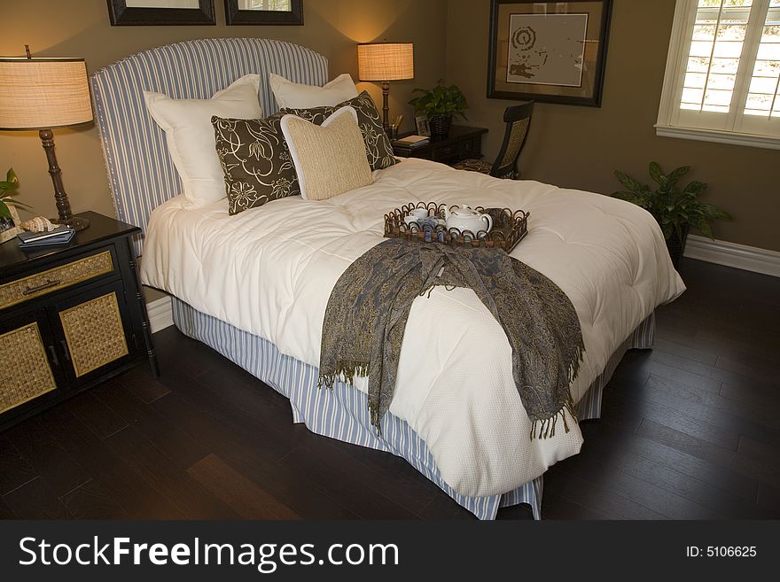 Luxury home bedroom with stylish furniture and decor. Luxury home bedroom with stylish furniture and decor.