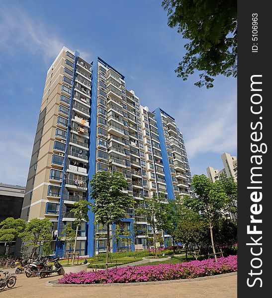 Apartment block with blue sky