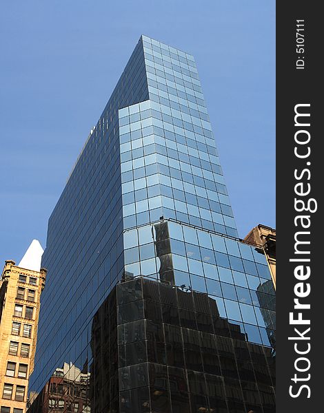 Reflective corporate building on a clear day. Reflective corporate building on a clear day