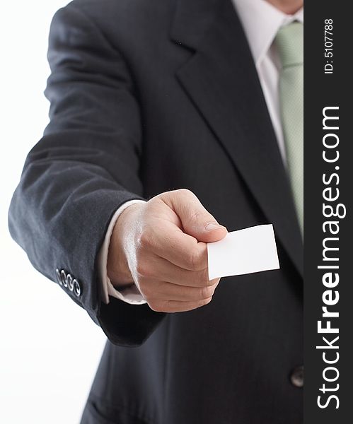 Hand of businessman offering businesscard on white background