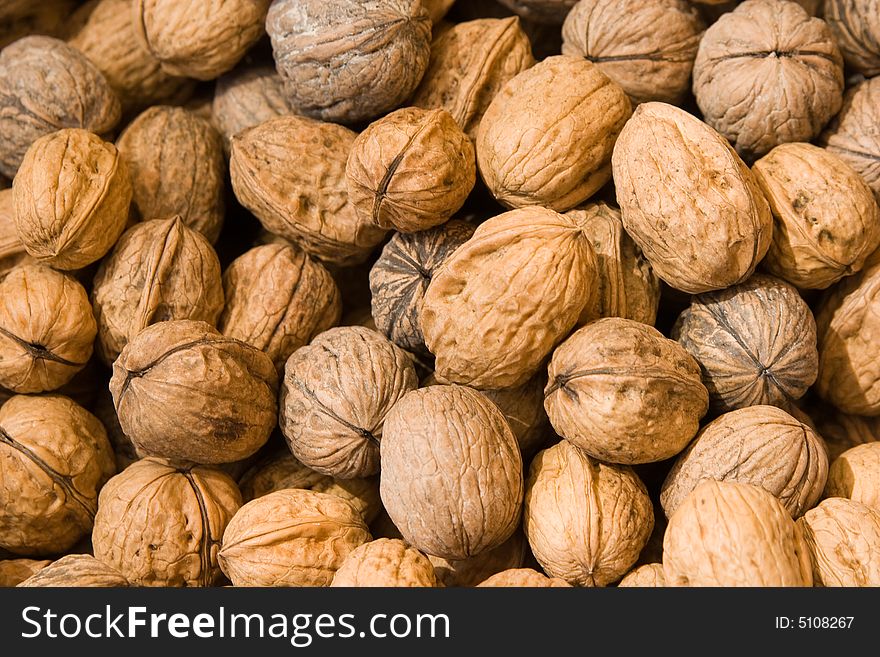 Walnuts background at the market