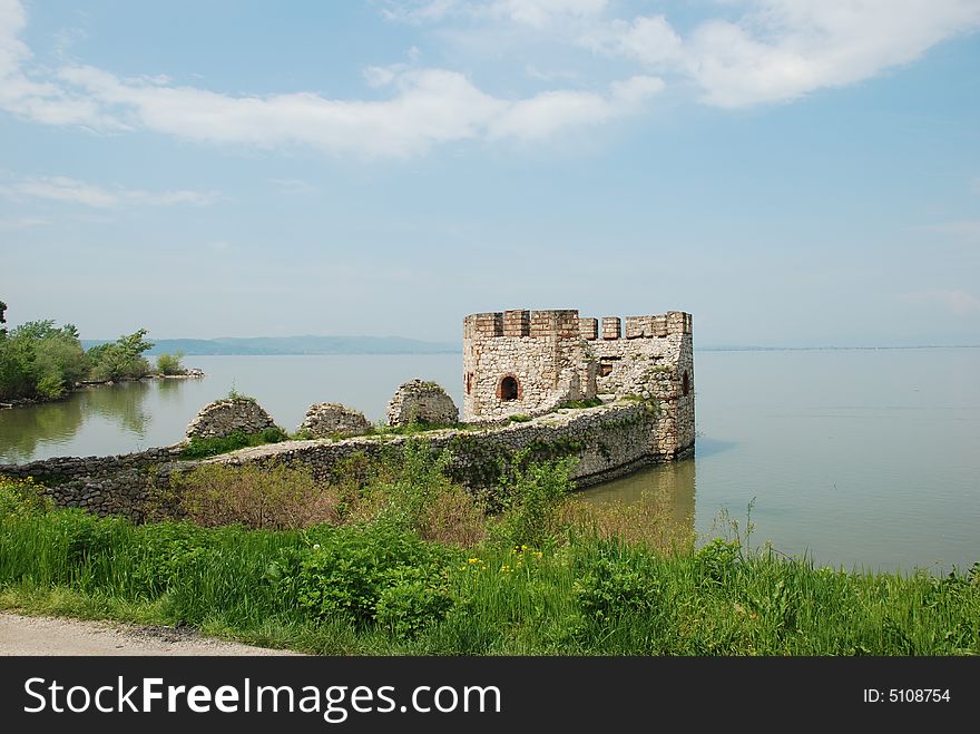 Old stone Serbian fortification on Danube tower in water. Old stone Serbian fortification on Danube tower in water