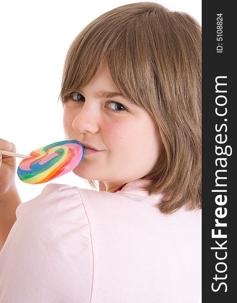 The girl with a sugar candy isolated on a white background