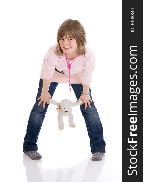 The young girl with a teddy bear isolated on a white background