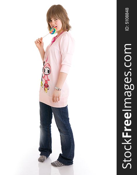 The girl with a sugar candy isolated on a white background