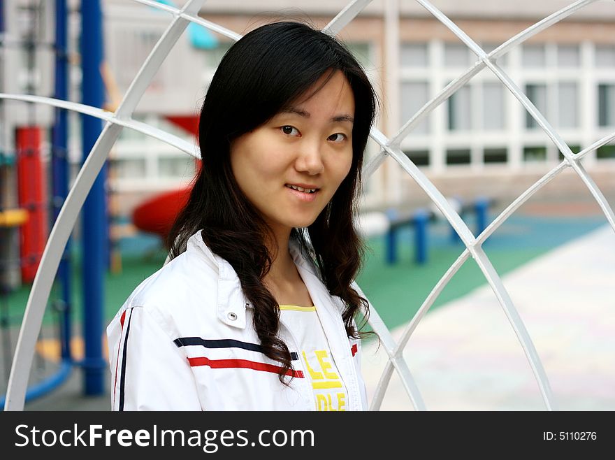 A Chinese girl with black long hair.