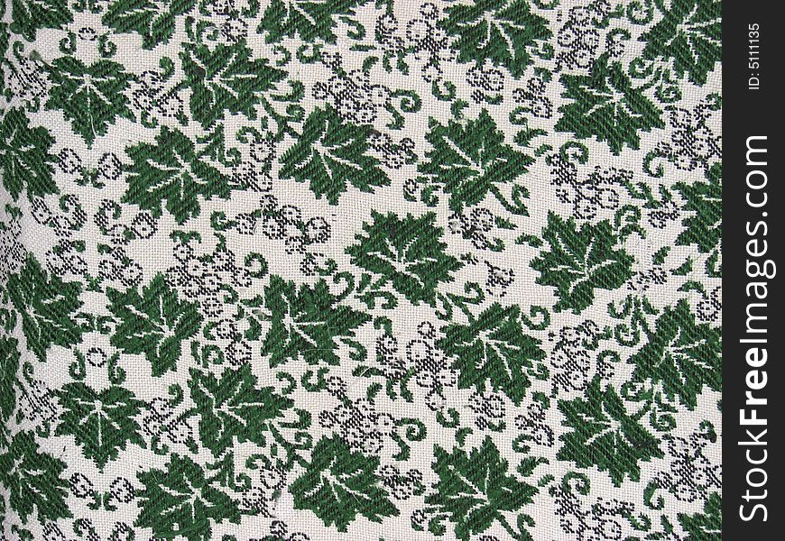 Fabric with green leafs pattern