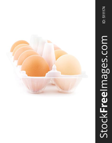 Isolated photo of some eggs in the white box