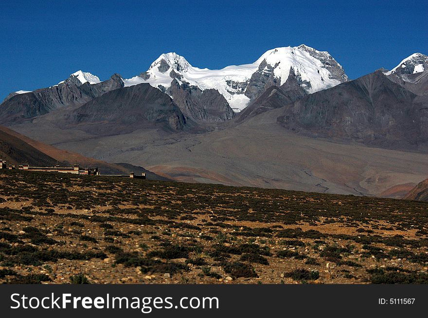 The Tibetan wilderness and snow mountain under the blue sky, frigid zone. The Tibetan wilderness and snow mountain under the blue sky, frigid zone.