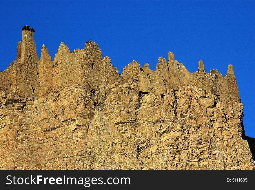 The remnant of a Tibetan castle against the blue sky,Gangba,Shigatse,. The remnant of a Tibetan castle against the blue sky,Gangba,Shigatse,