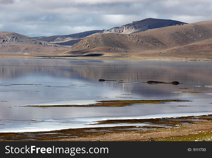 The peaceful lake in Tibet Plateau