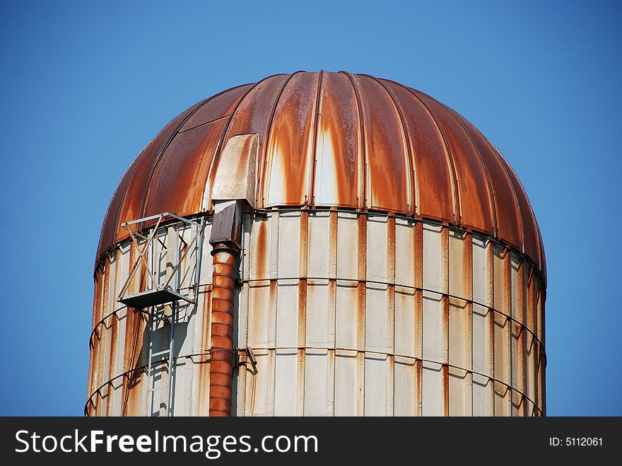 A picture of the upper half of a silo. A picture of the upper half of a silo.