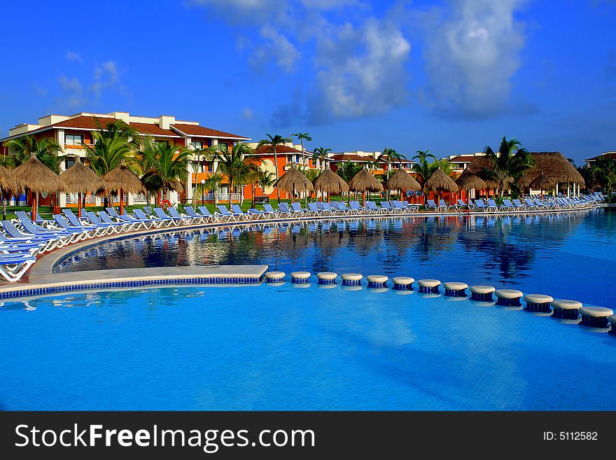 Listed Chairs around the  pool