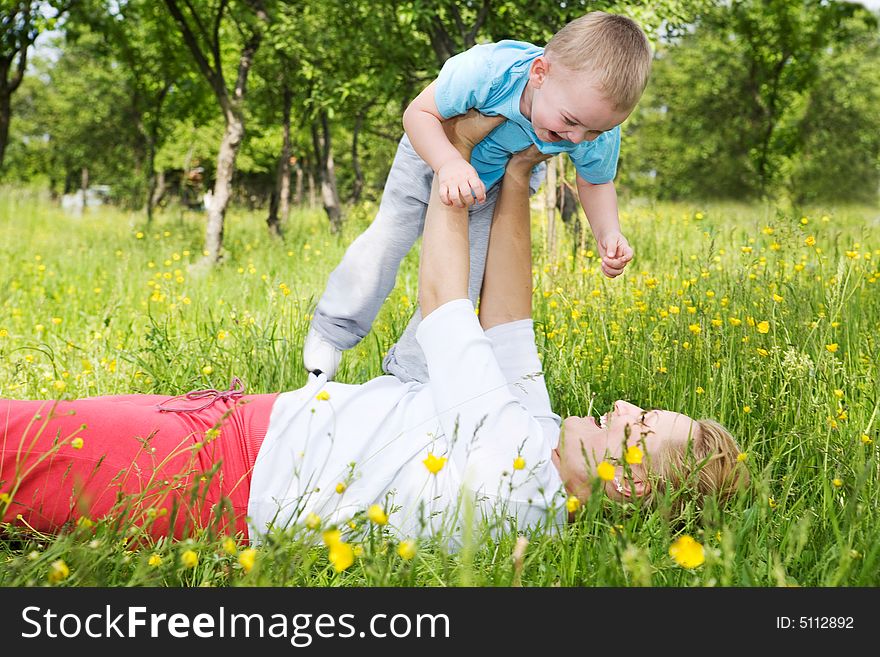 Mother and son playing together at the park