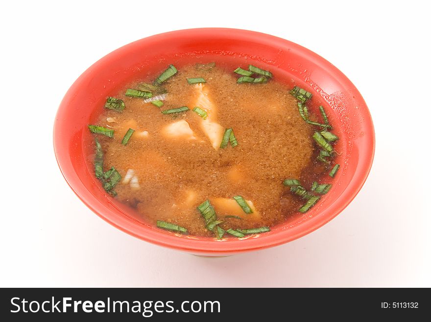 Chicken soup in plate on white. Chicken soup in plate on white