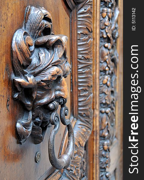 Close up of old wooden door with knocker. Close up of old wooden door with knocker