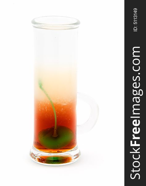 Alcohol cocktail with green cherry inside. Alcohol cocktail with green cherry inside