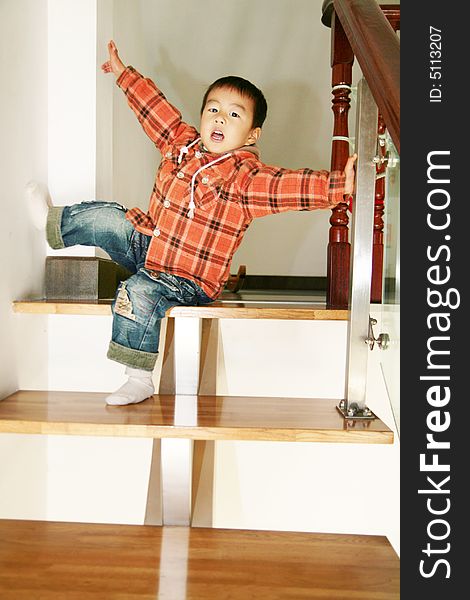 Asian Boy On Stair