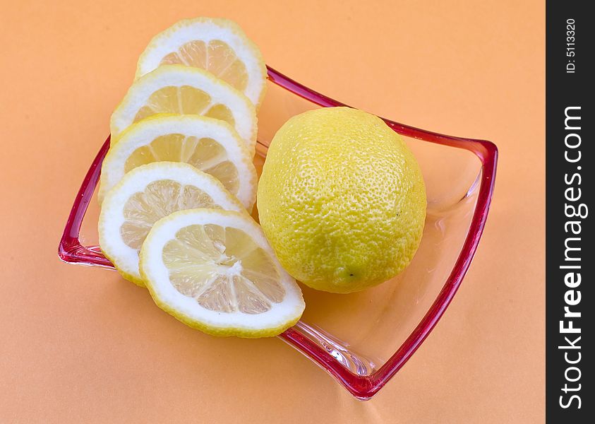 Lemon on the orange background
