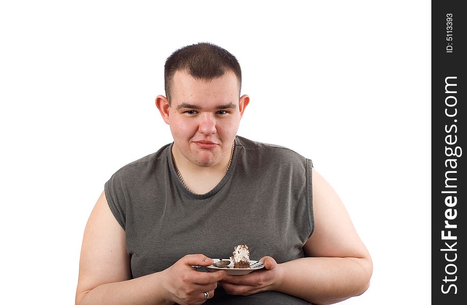 Man eats cake - photo on the white background