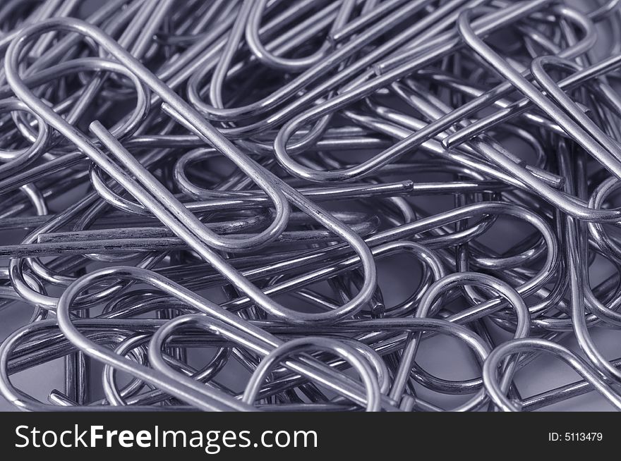 Close-up of paper-clips in duotone colors